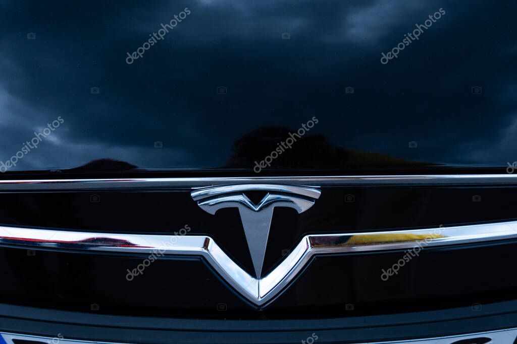 Closeup black electric tesla model S, automotive industry, Environmental sustainability, Berlin, Germany - April 26, 2024