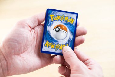 hobby collection Pokemon Trading Card Game, collectible card game for children, Battle with friends, Educational Games, Pokemon Fan Culture, Frankfurt - January 26, 2024 clipart