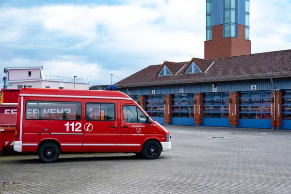 Stock image fire station building with red 112 fire Car, voluntary fire brigade, volunteering concept, fire fighting and community assistance, Bad Vilbel, Germany - May 31, 2024