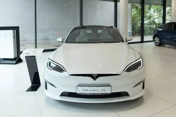 stock image White Model S Plaid, innovative electric car Tesla Motors in studio, trend in use EV in contemporary Europe, Automotive industry, Frankfurt, Germany - June 28, 2024