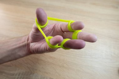 El kası güçlendirici yeşil kauçuk, el tutma aleti, egzersiz bandı, el kaslarını destekliyor, kırıklar ve felçten dolayı rehabilitasyon için uygun.