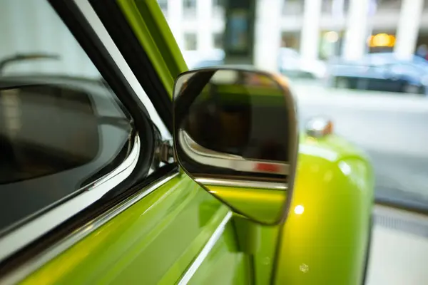 stock image close-up classic green vintage car Volkswagen VW Beetle Cabriolet, automotive nostalgia, display Iconic show Volkswagen Group Forum in Berlin, Germany - April 24, 2024