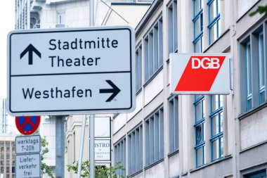 Red DGB sign, German Trade Union Confederation, advocating for improved worker conditions across Europe, banner European solidarity, labor rights and social justice, Frankfurt - July 22, 2024 clipart