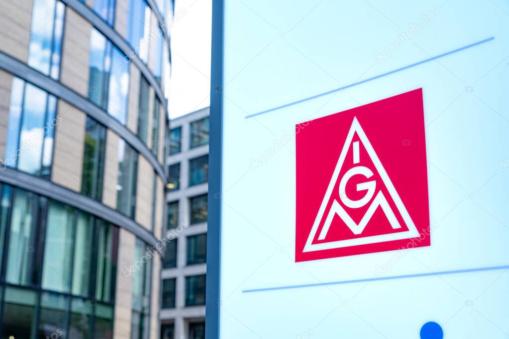 Red IGM advertising IG Metall sign, German dominant metalworkers union on building, holding sign in support, Europe's largest industrial union, Frankfurt - July 22, 2024