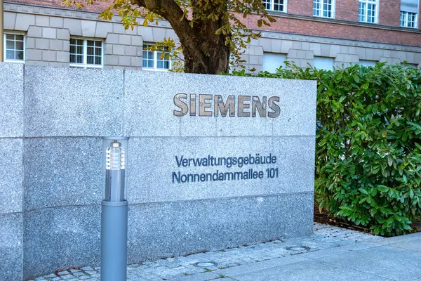 stock image Siemens logo, office German conglomerate Siemens AG operating electrical engineering, electronics, energy equipment, transportation and communications in Berlin, Germany - August 20, 2024