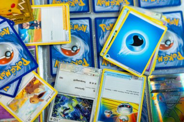 collecting Pokemon rading card collection, collectible card TCG, collecting hobby, Pokemon Fan Culture, Frankfurt - November, 18, 2024 clipart