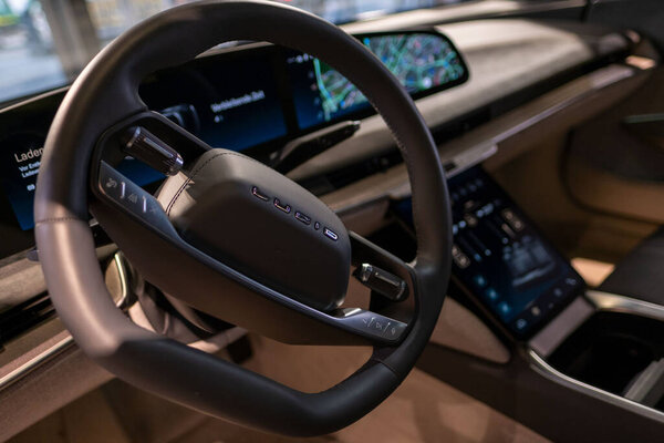 steering wheel, Interior electric Lucid Air, battery electric 4-door luxury sedan, future sustainable mobility Lucid Motors, advancements automotive industry, Frankfurt, Germany - January 25, 2025