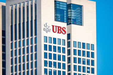 UBS bank office building, European banking, Swiss private investment bank, financial services company, glass facade, iconic logo in Germany professional services in Frankfurt - February 9, 2025 clipart