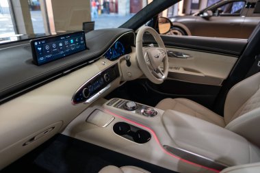Sol el tüm elektrikli Hyundai Genesis GV70 araç içi, direksiyon popüler Koreli yolcu aracı elektrikli araç, panel enstrümanları, Edinburgh, Birleşik Krallık - 24 Ekim 2024