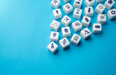 Blocks with business symbols icons. Conducting business and processes concept. Management and education. Learn and start your own business company. Make money, finance tools. Analytics and trends.