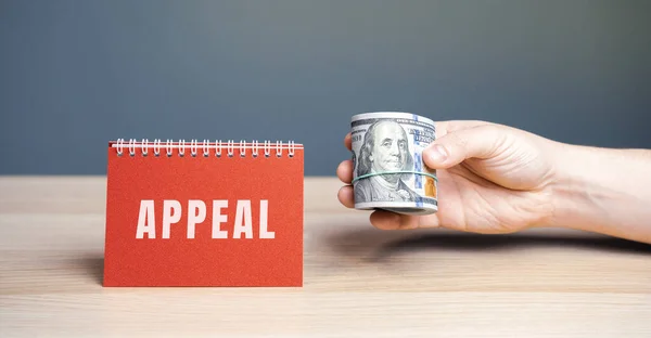 Notes Appeal and money. Appealing court decisions that have not entered into legal force in criminal and civil process. Request a formal change to an official decision. Business and finance concept
