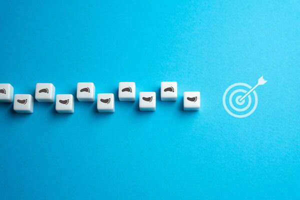 Go to the goal. Metaphor for achieving a task. Climb to success. Get to the top. Progress, effort, and determination. Ascend and conquer obstacles