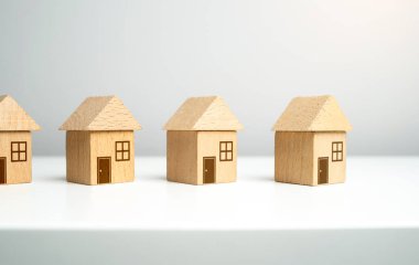 Oyuncak bloklardan yapılmış özel evler. İpotek. Konut binalarının değeri. Emlakçı servisi. Satın alma ve satma. En uygun konut seçeneklerini bul. Emlak piyasasında teklifler.