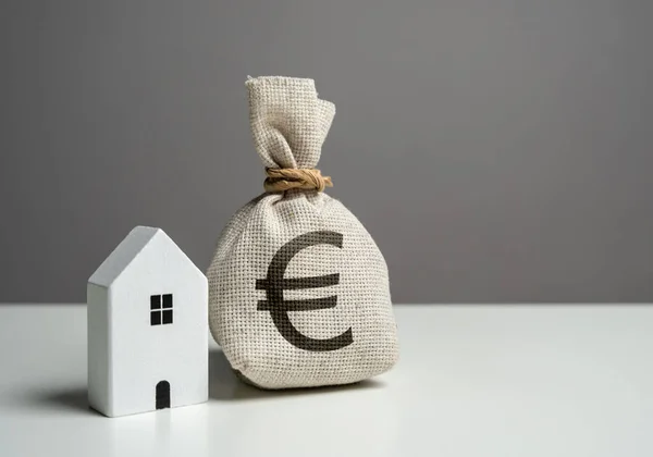 House and euro money bag. House price, property valuation. Investments in the purchase of real estate. Repair and service. Make a deal. Insurance