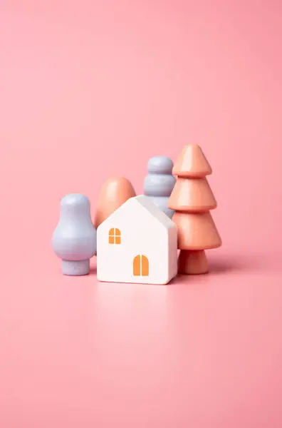 Houses and trees in pretty colors. Mortgage and loan. Affordable housing. Buying a nice house.