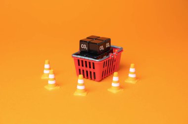 Alışveriş sepeti ve karbondioksit küpü. Yaşam tarzınız ve alışkanlıklarınızla çevre üzerindeki etkiyi anlamaya çalışın. Sera gazı tüketimi ve ayak izi. Müşteriler karbon ayak izi.