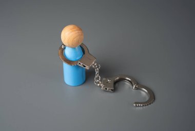 Bir adam ve kelepçeleri aç. Özgür ve özgür. Ağırlaştırıcı bir yük ya da güçlü bir el arıyoruz. Psikolojik sorunlar, bağımlılıklar. İnsan hakları.