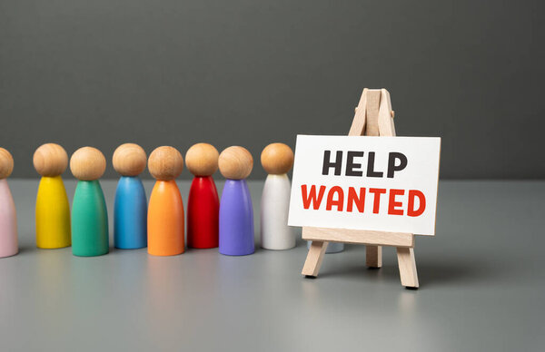 Queue and help wanted sign. Job candidates. Simplification of procedures for accepting foreign workers. Opening of new jobs. Attract investors who provide financial support. Hiring workers