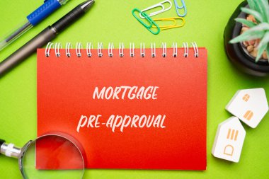 Mortgage pre-approval concept. Preliminary evaluation by a lender to determine the maximum loan amount a borrower can qualify for based on their financial status. Notepad, houses and magnifying glass clipart