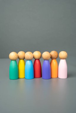 Multi-colored figures of people stand in a row. Multiculturalism and diversity. Standing united. Celebrating unique identities, fostering global unity, and embracing diversity in modern societies. clipart