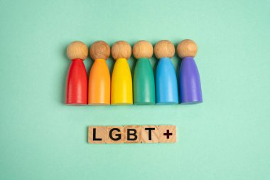 Çok renkli insan figürleri - LGBT temsilcileri konsepti. Kendinizi cinsel yönelimler listesinde bulun. Kendini tanıtma, cinsel yönelimleri keşfetme ve kişisel kimliğini benimseme..