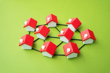 Evler bir ağa hatlarla bağlanır. Mahalle, toplum. İnternet ya da iletişim kurmak. Bağlantı, topluluk oluşturma.