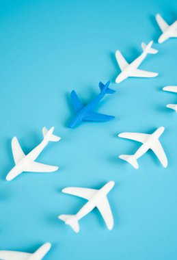Planes fly on routes. Blue plane. Flights and discounts. Depicts airline route stability, travel planning, or budget tourism. Discount offers, promotional campaigns