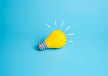 Ampul fikri. Minimalizm. Yaratıcılık, yenilik, başlangıç vizyonu, problem çözme, eğitim, tasarım kavramları ve kişisel üretkenlik stratejileri.