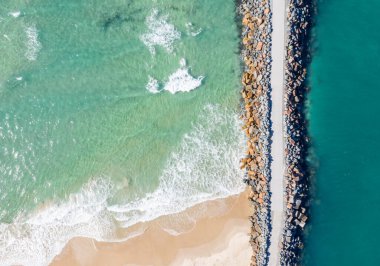 Top down view of North Haven Beach and breakwall - Mid North Coast of NSW Australia clipart