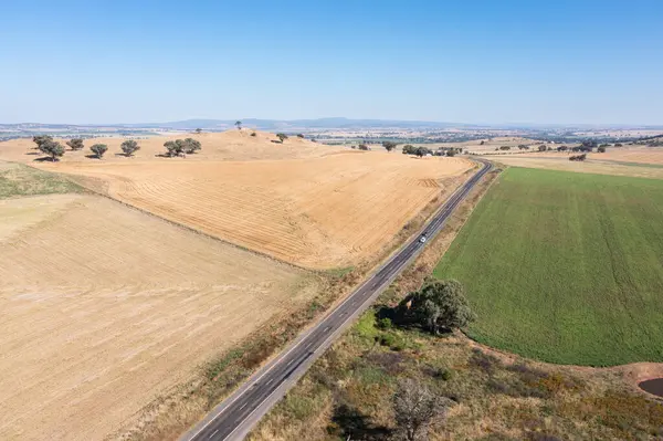 stock image Aerial view of rural area around Canowindra featuring wheat fields and crops with the Canowindra Road disappearing into the landscape.