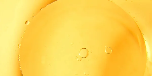 黄色の泡の背景 調理油乳剤 フライパン — ストック写真