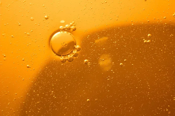 黄色の泡の背景 調理油乳剤 フライパン ストック写真