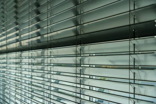 Atölye ve ofis metali arka planda yatay körlük çizgisi ayrıntıları.