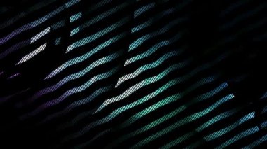 Siyah arkaplanda renkli hareket eden dalgalara sahip video