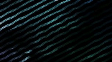 Siyah arkaplanda renkli hareket eden dalgalara sahip video