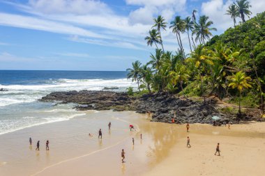 Sand, waves and rocks at Havaizinho beach, Itacare, Bahia, Brazil