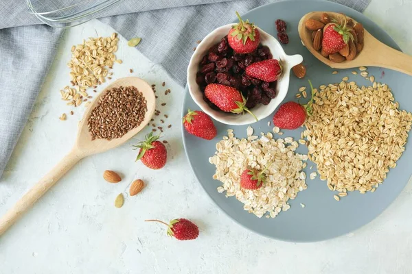 Oatmeal Fresh Strawberries Plate Raisins Nuts Seeds Table Healthy Breakfast — Stock Photo, Image