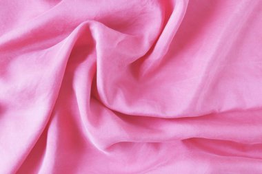 Pembe saten kumaş dokusu arkaplanı. Tasarım için soyut arkaplan ve doku.