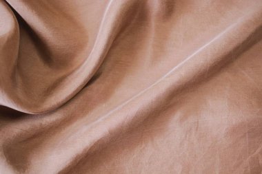 Doku, arka plan, desen. Kahverengi ipek kumaş. Düz bir mat yüzeyine sahiptir ve tasarım için uygundur. 