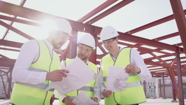 Professional Civil Engineers Vests Helmets Read Project Plan Discussing Process — Stock videók