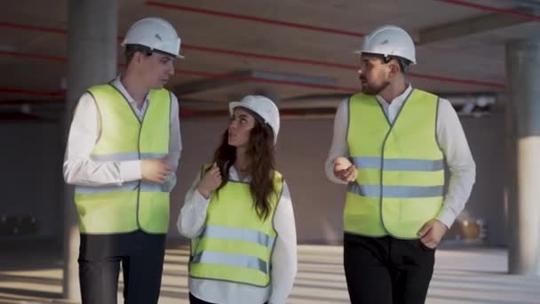 Group Civil Engineers Protective Helmets Walking Industrial Construction Site High — Video
