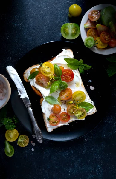 Cream Cheese Toast Cherry Colorful Tomatoes Black Moody Background Top — Stock fotografie