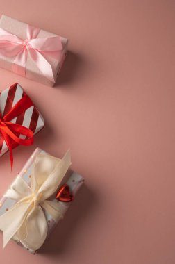 Valentines day gift boxes and satin bow, copy space, birthday, Mothers Day.