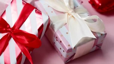 Valentines gift boxes closeup with satin bows, birthday, Mothers Day.