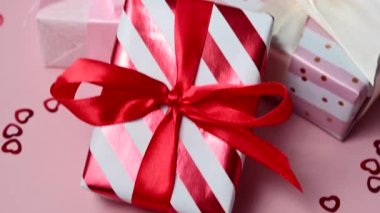 Valentines gift boxes closeup with satin bows, birthday, Mothers Day.