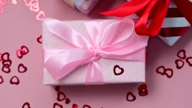Valentines gift boxes closeup with satin bows, birthday, Mothers Day.