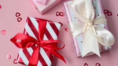 Valentines gift boxes closeup with satin bows, birthday, Mothers Day.
