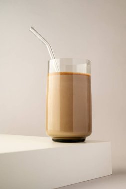 Chocolate protein shake, drink with protein powder with glass straw