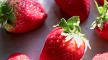 Macro strawberry, fresh berry in bowl. Summer fruits.