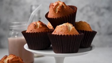 Classic muffins on cake stand. Delicious sweet dessert